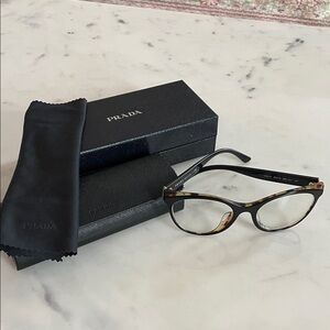 Prada Women's Black and Tortoise Glasses